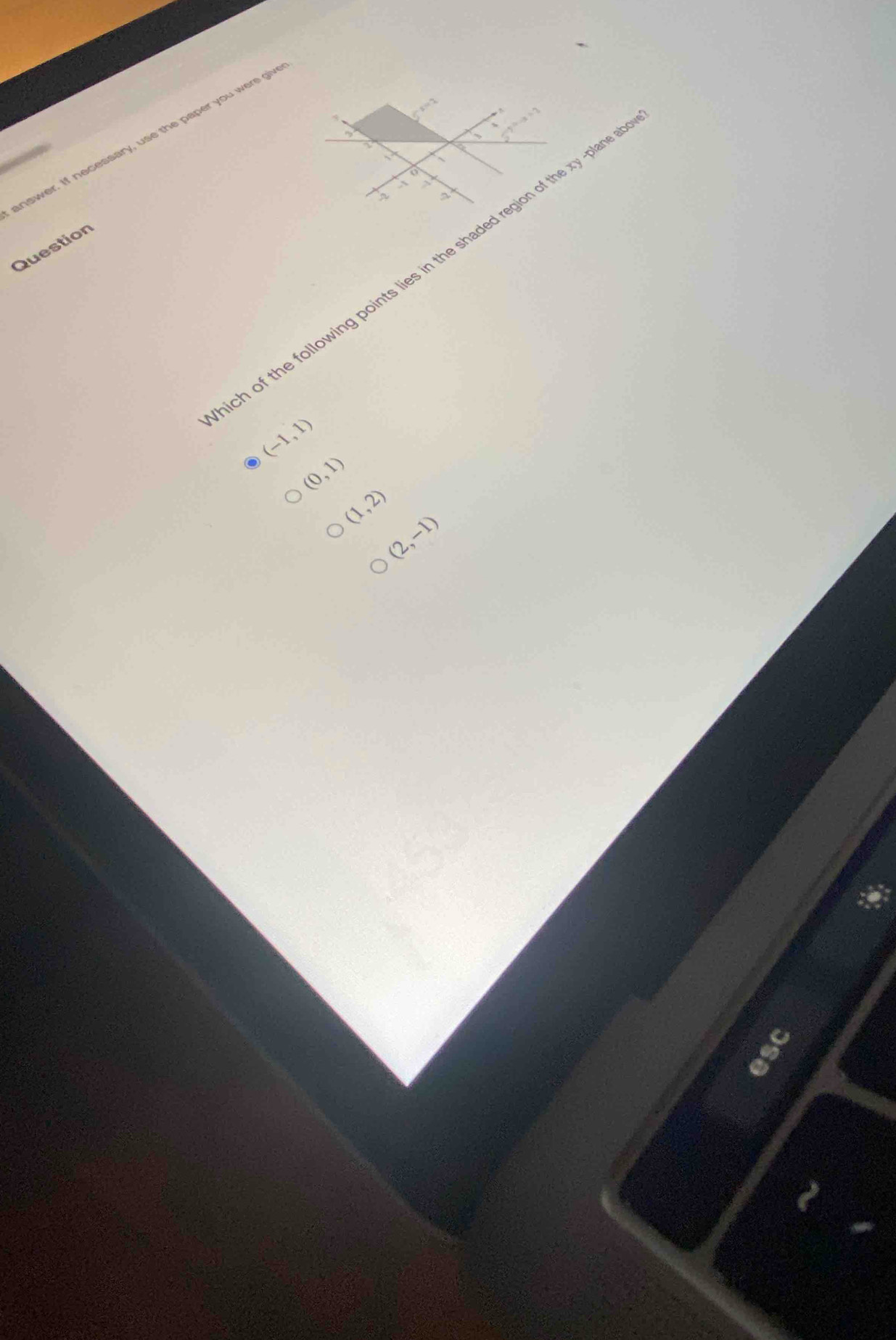 answer. If necessary, use the paper you were giv
o
.
n
Question
h of the following points lies in the shaded region of the xy -plane
(-1,1)
(0,1)
(1,2) (2,-1)