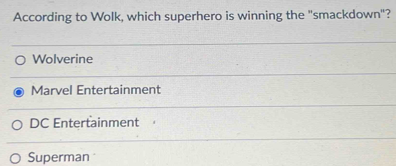 According to Wolk, which superhero is winning the "smackdown"?
Wolverine
Marvel Entertainment
DC Entertainment
Superman