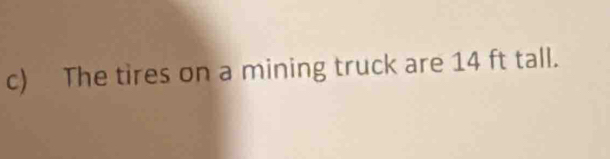 The tires on a mining truck are 14 ft tall.