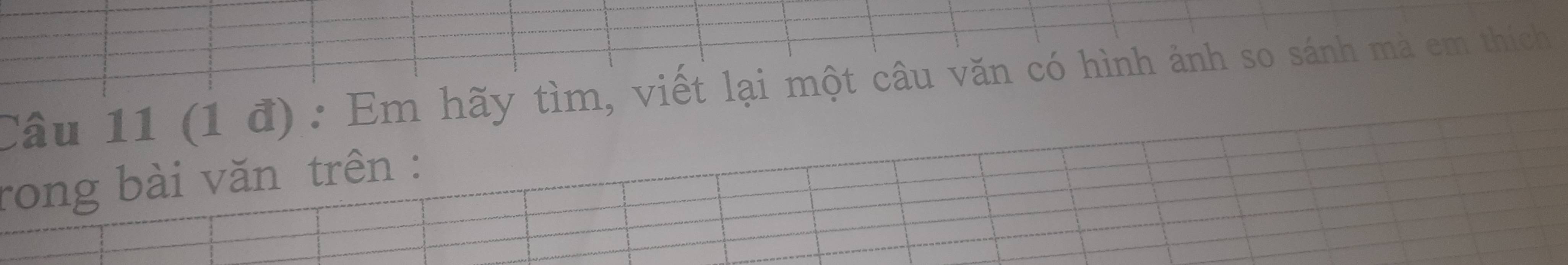 (1 đ): Em hãy tìm, viết lại một câu văn có hình ảnh so sánh mà em thích 
rong bài văn trên :