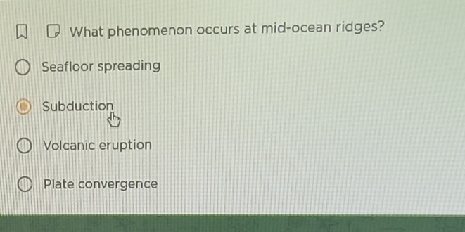 What phenomenon occurs at mid-ocean ridges?
Seafloor spreading
Subduction
Volcanic eruption
Plate convergence