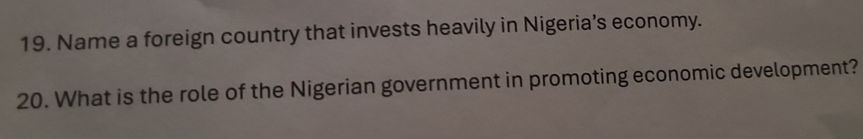 Name a foreign country that invests heavily in Nigeria’s economy. 
20. What is the role of the Nigerian government in promoting economic development?