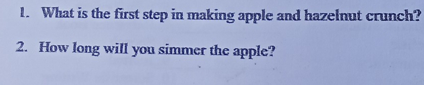 What is the first step in making apple and hazelnut crunch? 
2. How long will you simmer the apple?