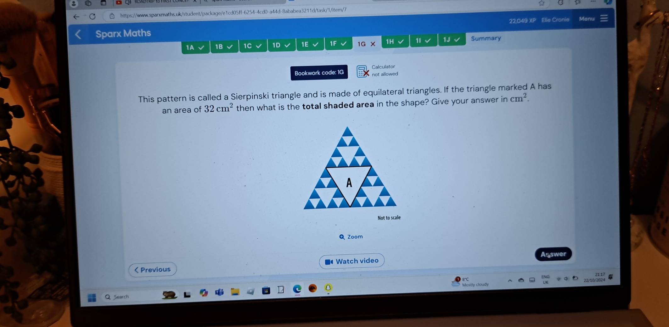 ☆ 
22,049 XP Elie Cronie Mer 
Sparx Maths 
1A 1B 1C 1D 1E 1F 1G* 1H v 1I 1J Summary 
Calculator 
Bookwork code: 1G not allowed 
This pattern is called a Sierpinski triangle and is made of equilateral triangles. If the triangle marked A has 
an area of 32cm^2 then what is the total shaded area in the shape? Give your answer in cm^2. 
A 
Not to scale 
Q Zoom 
Watch video Answer