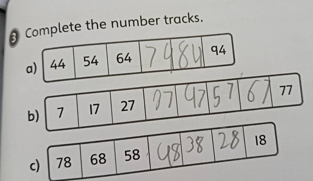 Complete the number tracks. 
a) 44 54 64
q4