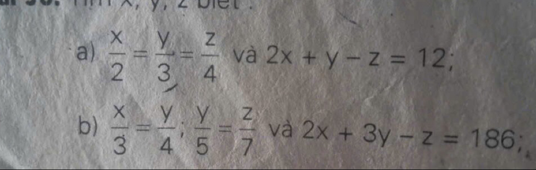  x/2 = y/3 = z/4  và 2x+y-z=12; 
b)  x/3 = y/4 ;  y/5 = z/7  và 2x+3y-z=186;