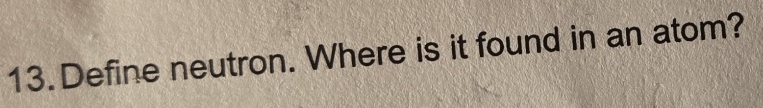 Define neutron. Where is it found in an atom?