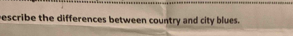 bescribe the differences between country and city blues.