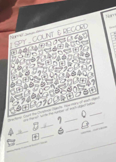 Nam 
Direct 
O 
I SPY ... COUNT & RECORD Name 
. 
Directions: Count the Christmas Objects. How many of each objec 
are there? Write the number of each object below 
_ 
_ 
__* ''SAchc _SASTYAS EANT & RCEORD