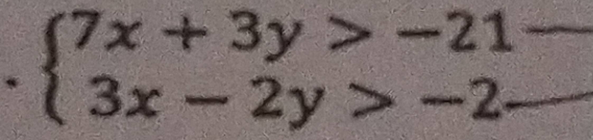 beginarrayl 7x+3y>-21 3x-2y>-2-endarray.