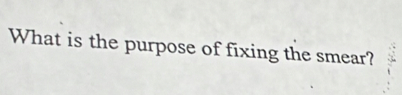 What is the purpose of fixing the smear?