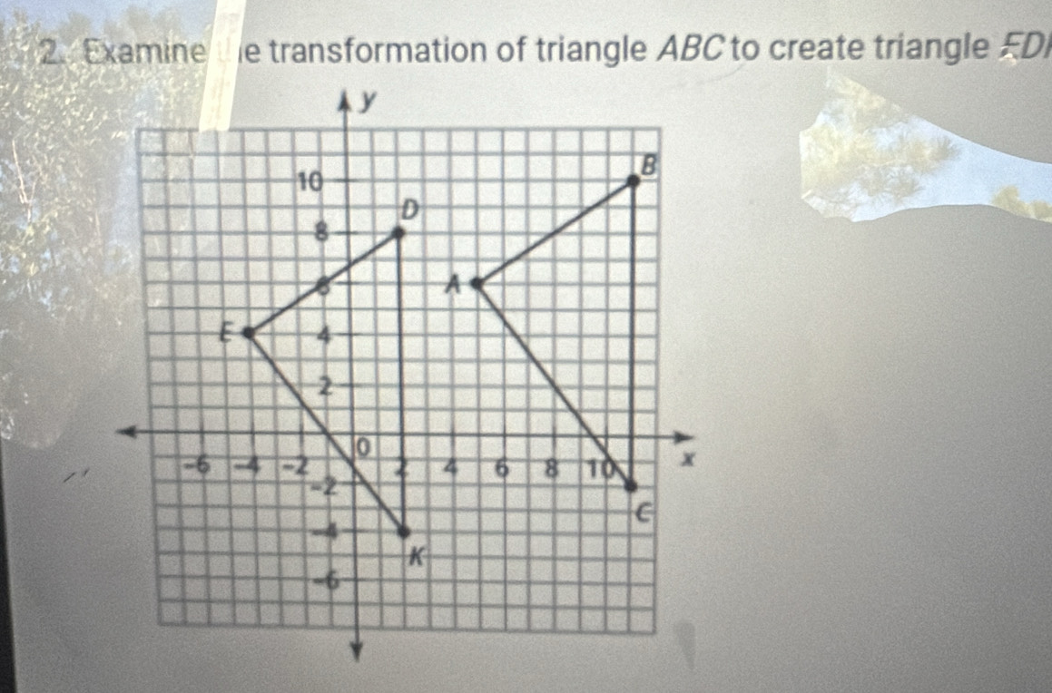 Examine e transformation of triangle ABC to create triangle ED