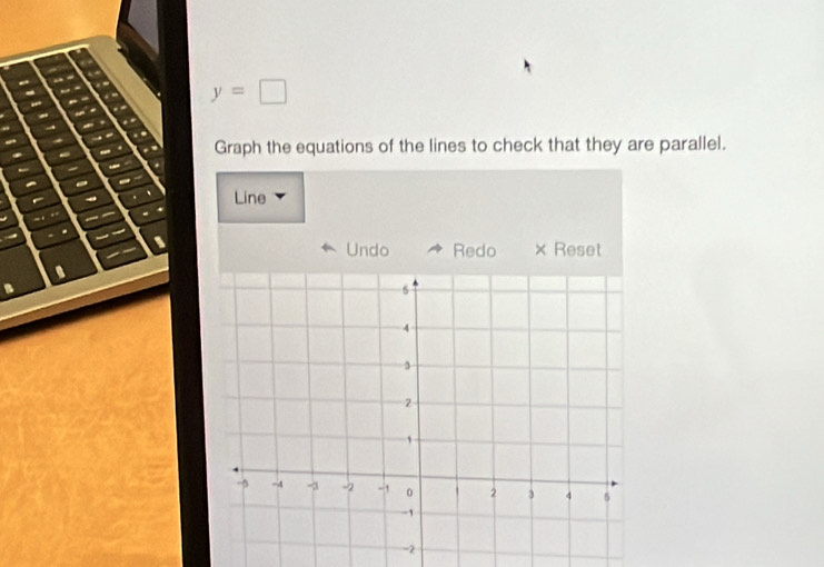 “
y=□. 
Graph the equations of the lines to check that they are parallel. 
← a 
. Line 
、 
Undo Redo × Reset 
. 
n