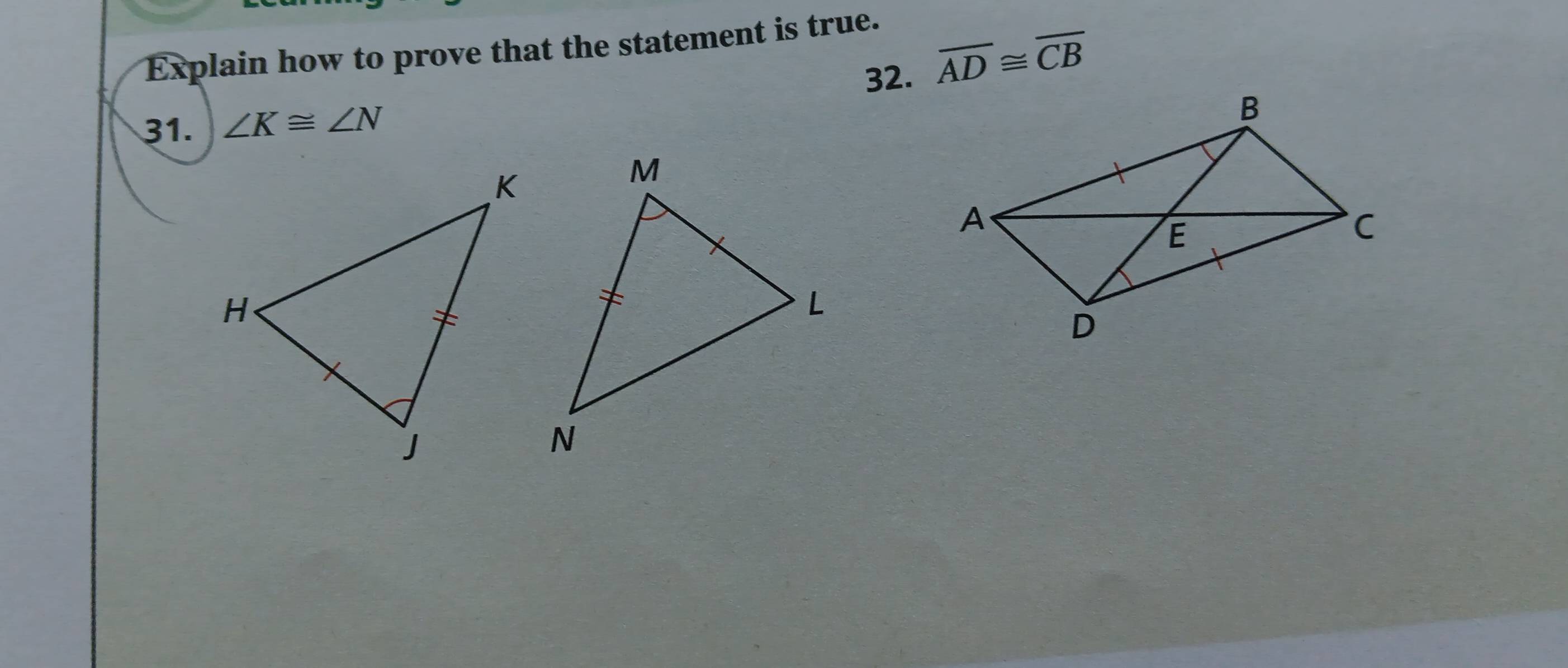 Explain how to prove that the statement is true. 
32. overline AD≌ overline CB
31. ∠ K≌ ∠ N