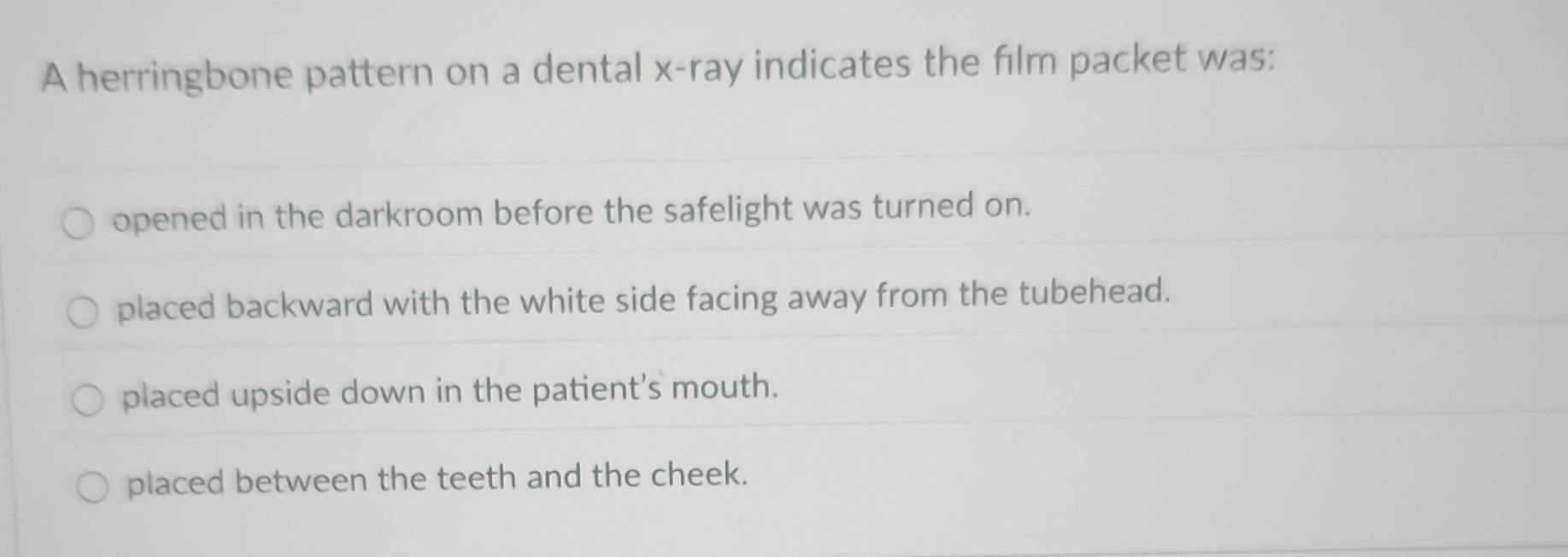 Solved: A herringbone pattern on a dental x -ray indicates the film ...