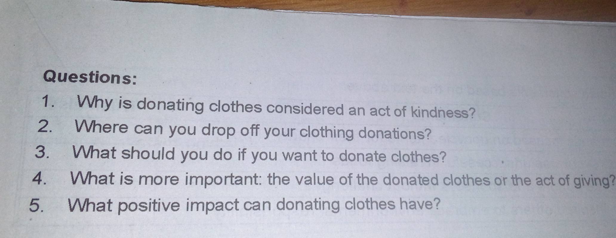 Why is donating clothes considered an act of kindness? 
2. Where can you drop off your clothing donations? 
3. What should you do if you want to donate clothes? 
4. What is more important: the value of the donated clothes or the act of giving? 
5. What positive impact can donating clothes have?