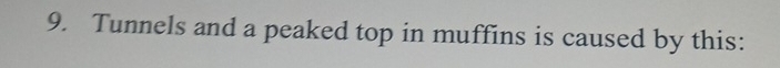 Tunnels and a peaked top in muffins is caused by this: