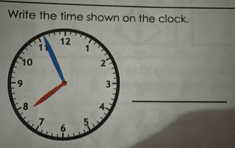 Write the time shown on the clock. 
_