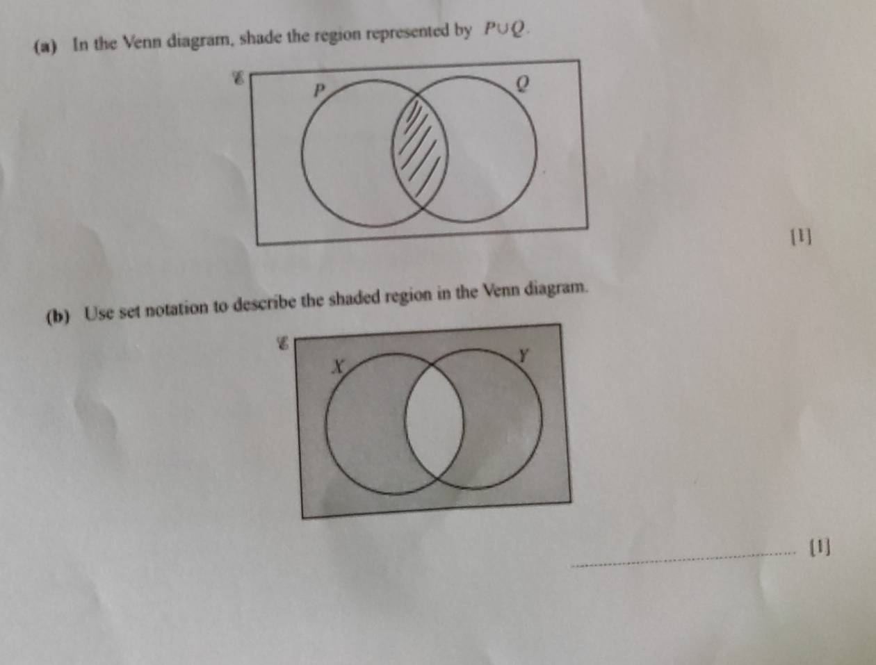 In the Venn diagram, shade the region represented by P∪ Q. 
[1] 
(b) Use set notation to describe the shaded region in the Venn diagram. 
_[1]