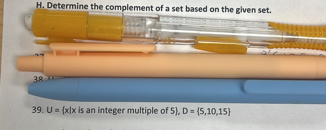 Determine the complement of a set based on the given set. 
38 
39. U= x|x is an integer multiple of 5, D= 5,10,15