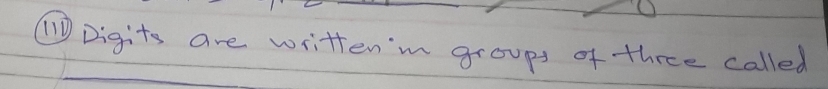 1Digits are writtenn groups of three called