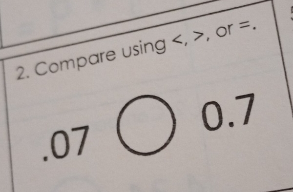 Compare using , , or°. 
.07bigcirc 0.7^(□)