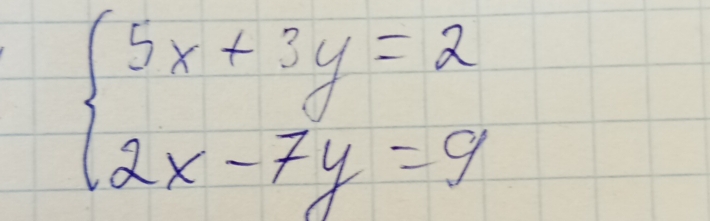 beginarrayl 5x+3y=2 2x-7y=9endarray.