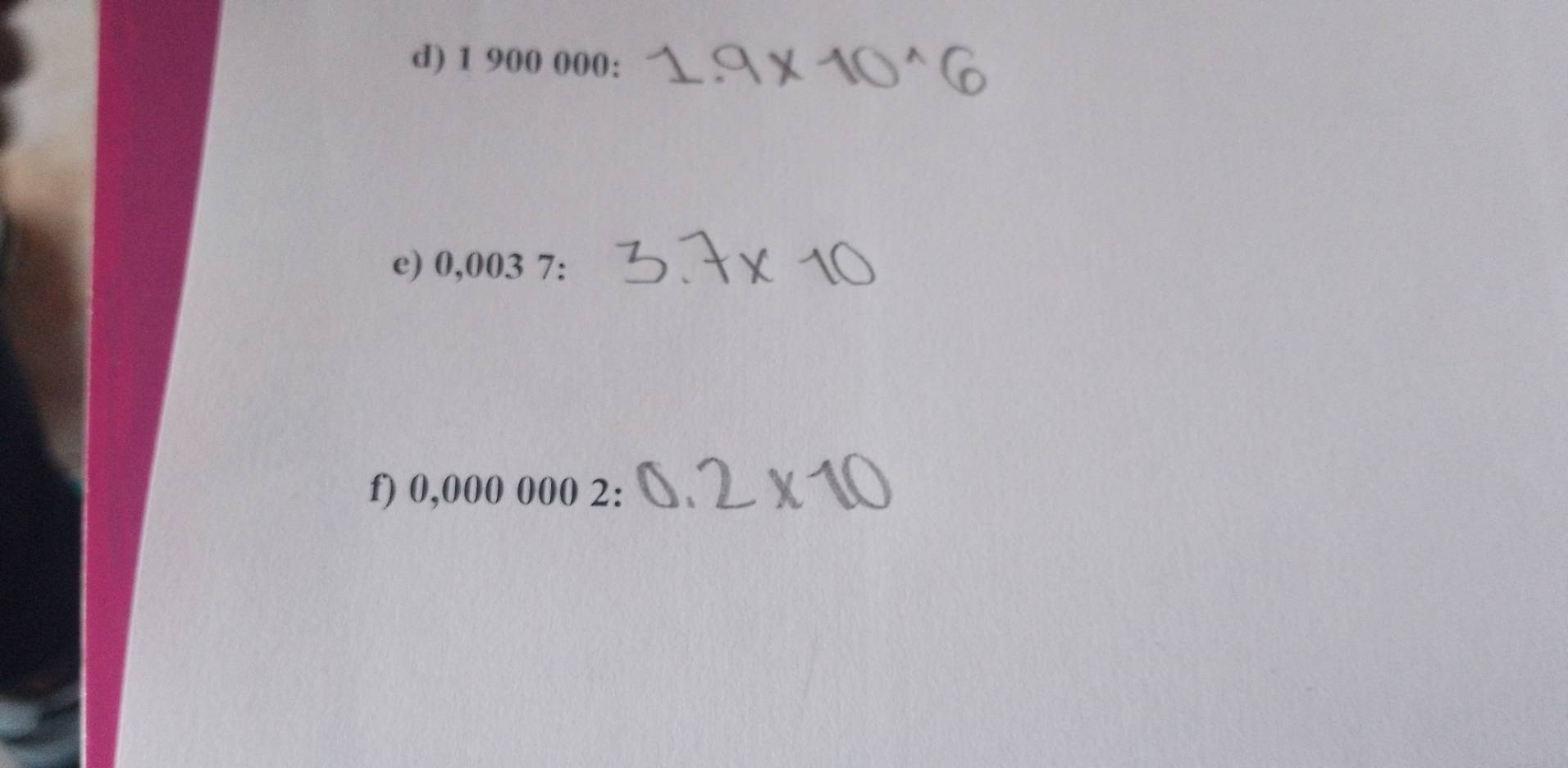 1 900 000 : 
e) 0,003 7: 
f) 0,00 ( )0002.