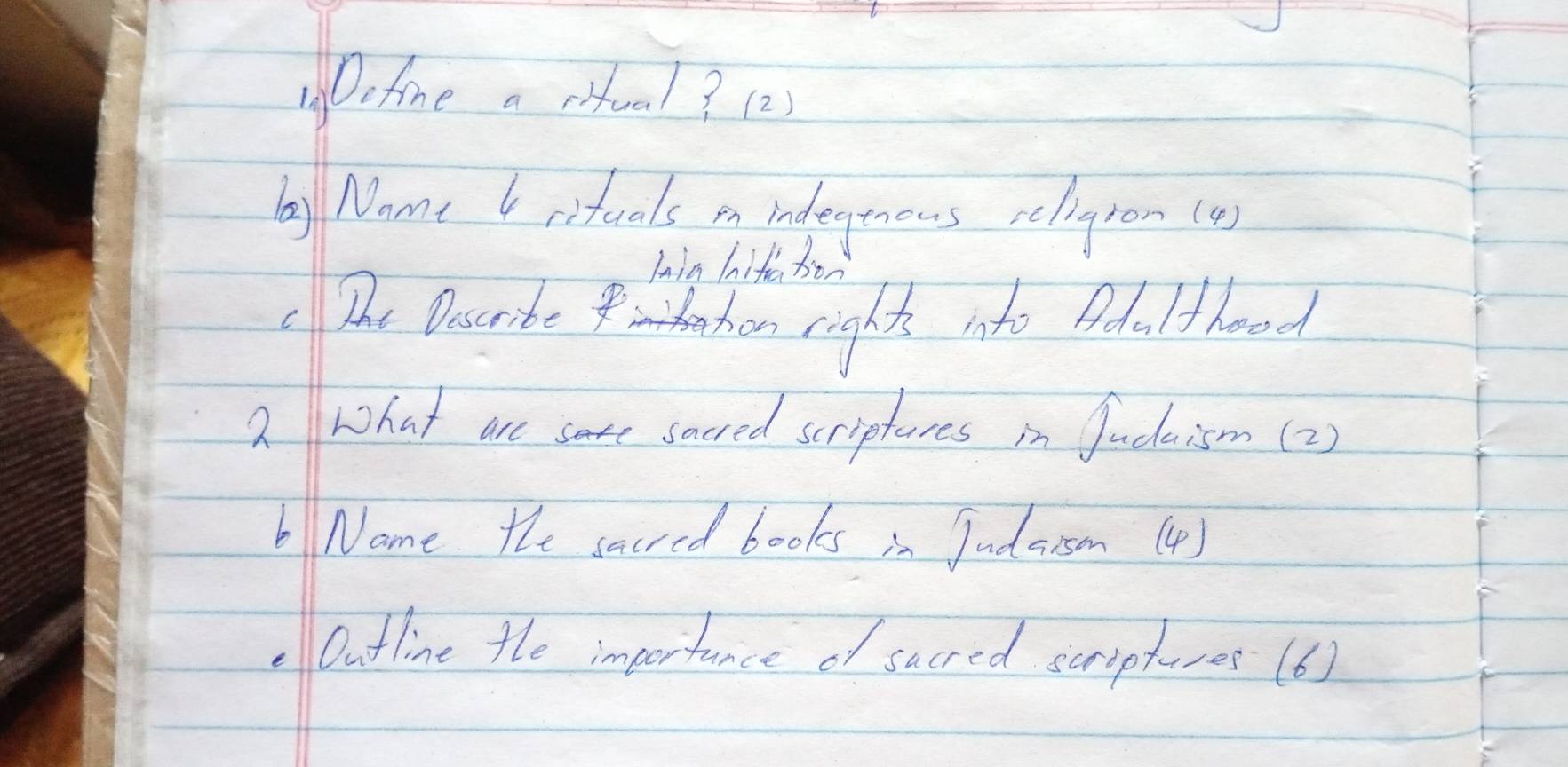 Define a ritual? (2) 
bay Name I rifuals in indegenous relingron (a) 
Iin hifiú ho 
The Ooscribe hn rights into Adalthood 
2What are same sacred scriptores in Sudaism(2) 
bNome the sacred books in Judaism(4) 
, Outline the importance of sucred suriptures (6)