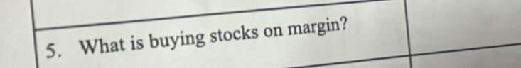 What is buying stocks on margin?