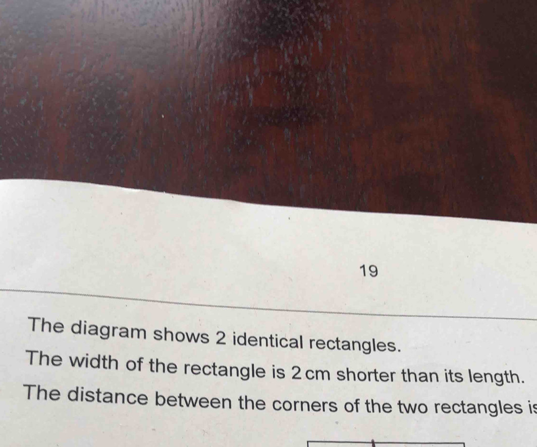 Solved: The diagram shows 2 identical rectangles. The width of the ...