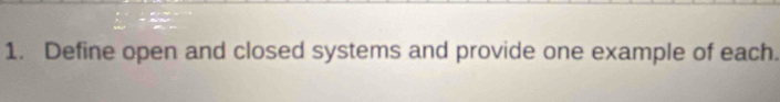 Define open and closed systems and provide one example of each.