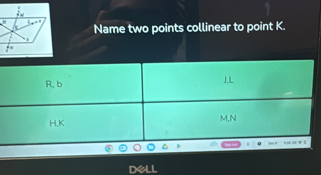 Name two points collinear to point K. 
dell