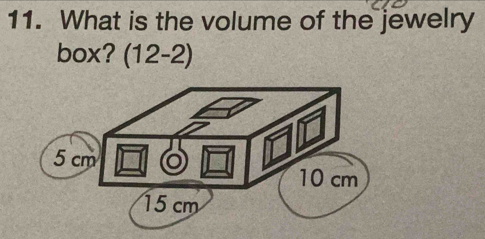 What is the volume of the jewelry 
box? (12-2)