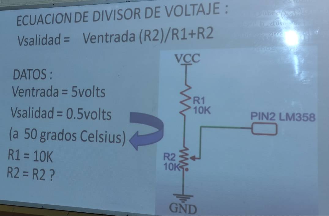 ECUACION DE DIVISOR DE VOLTAJE : 
sabez 
C 
Vsalidad = Ventrada (R2)/R1+R2
are 
DATOS : 
Ventrada = 5volts
Vsalidad =0.5v olts 
(a 50 grados Celsius)
R1=10K
R2=R2 ? 
GND